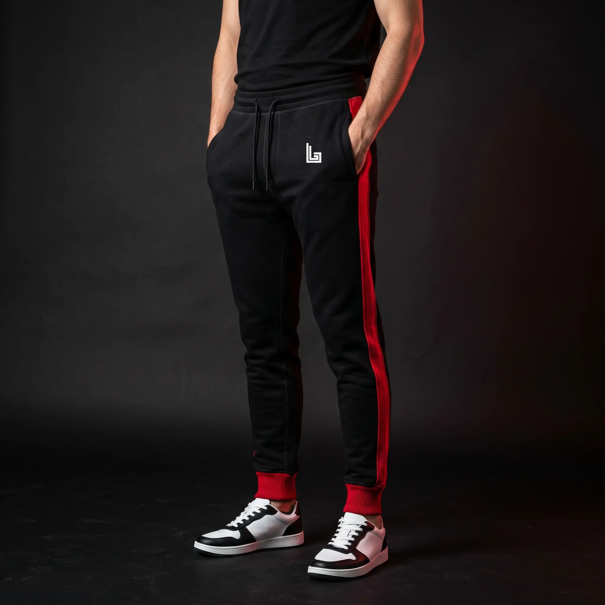 Custom athletic joggers with red side stripes and elastic ankle cuffs