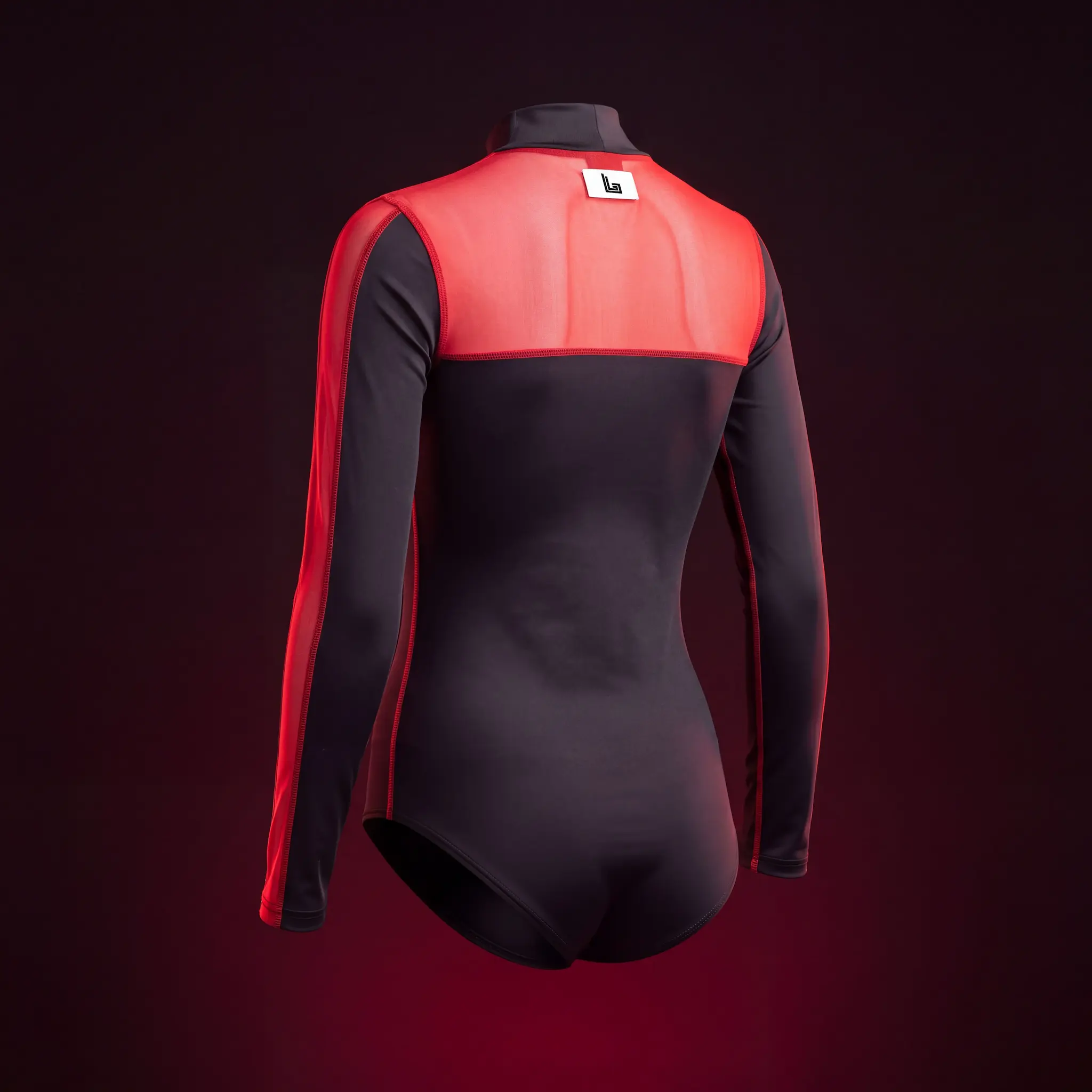 Custom festival bodysuit in black stretch fabric with red mesh inserts