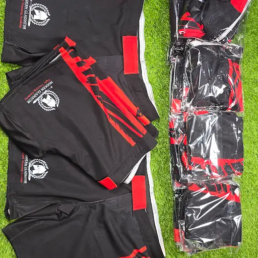 Custom sublimated MMA shorts for a fight training academy, packed and ready to ship from Lethletic