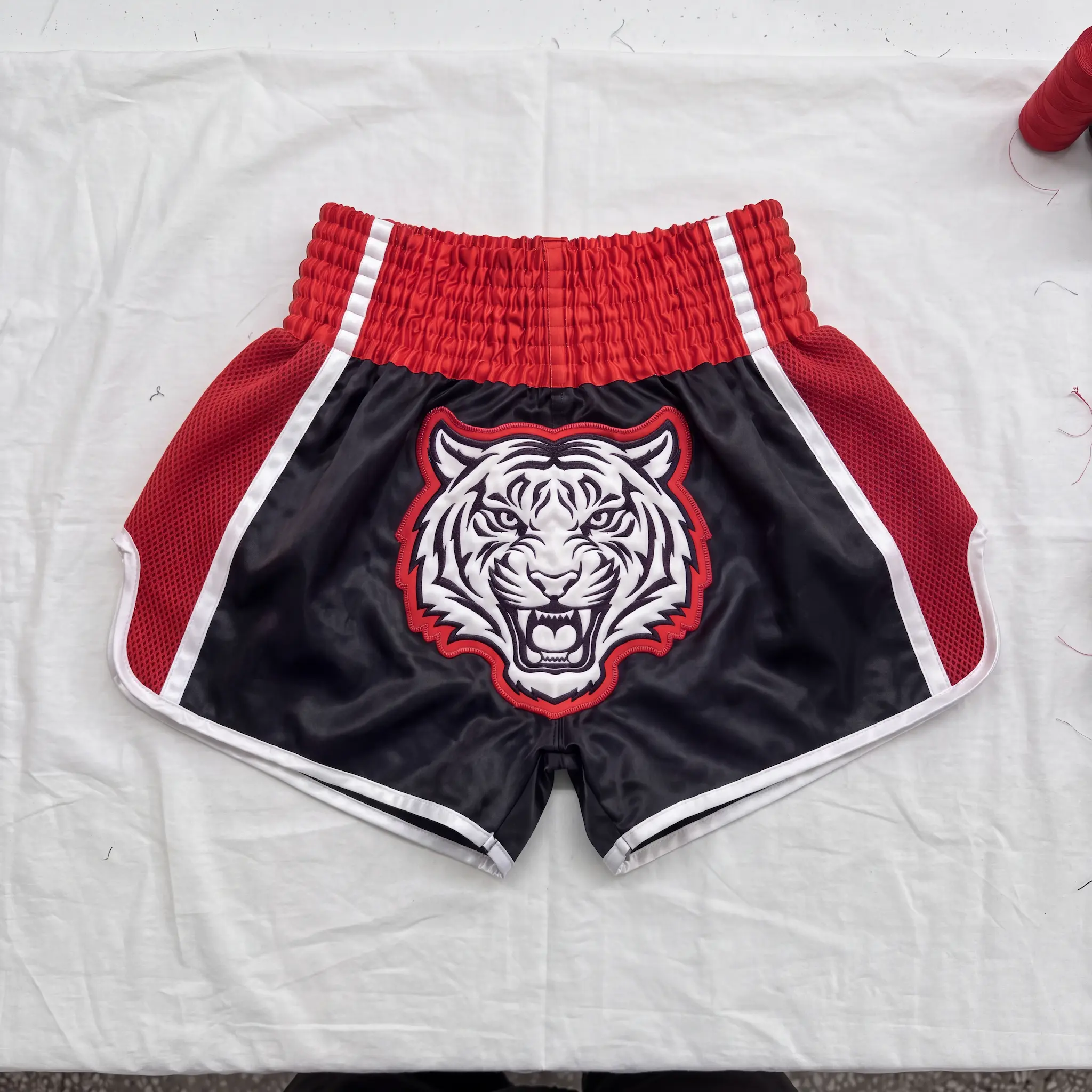 30 custom Muay Thai shorts made for a USA Muay Thai club by Lethletic