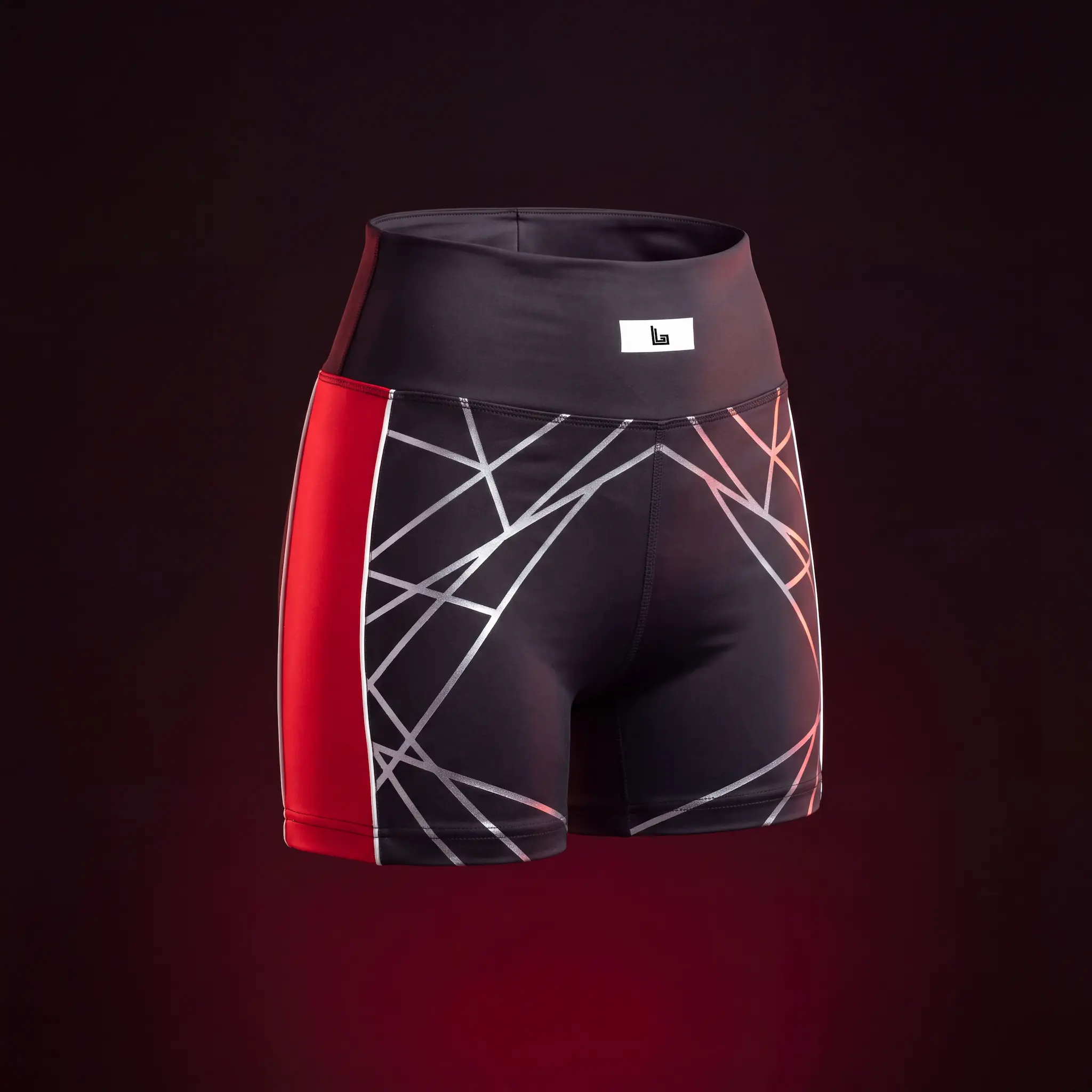 Custom high-waist rave shorts in stretch fabric with reflective print