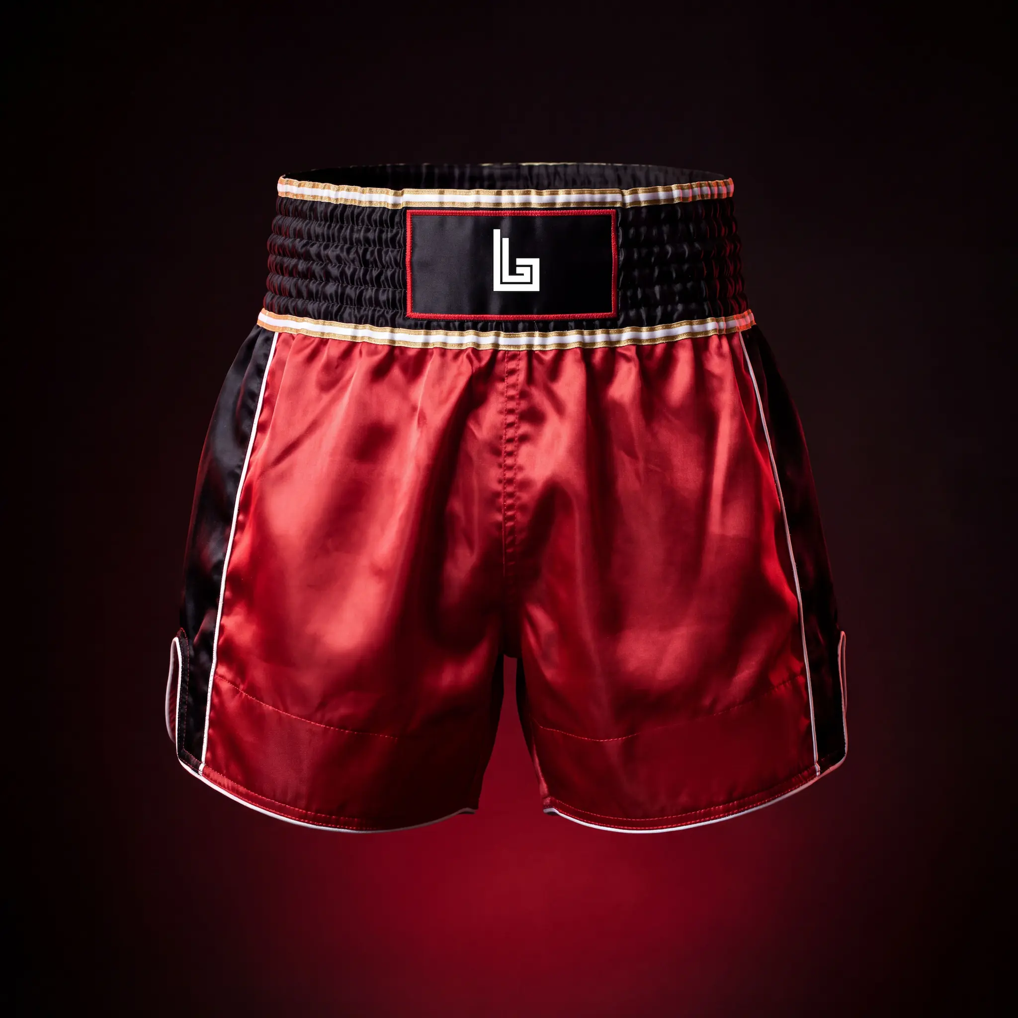 Custom retro Muay Thai shorts with Thai script embroidery by Lethletic
