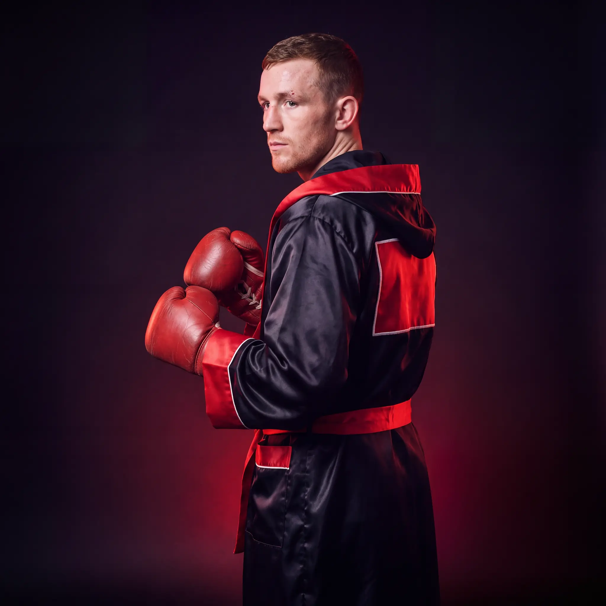 Custom satin boxing robe with embroidered fighter name by Lethletic