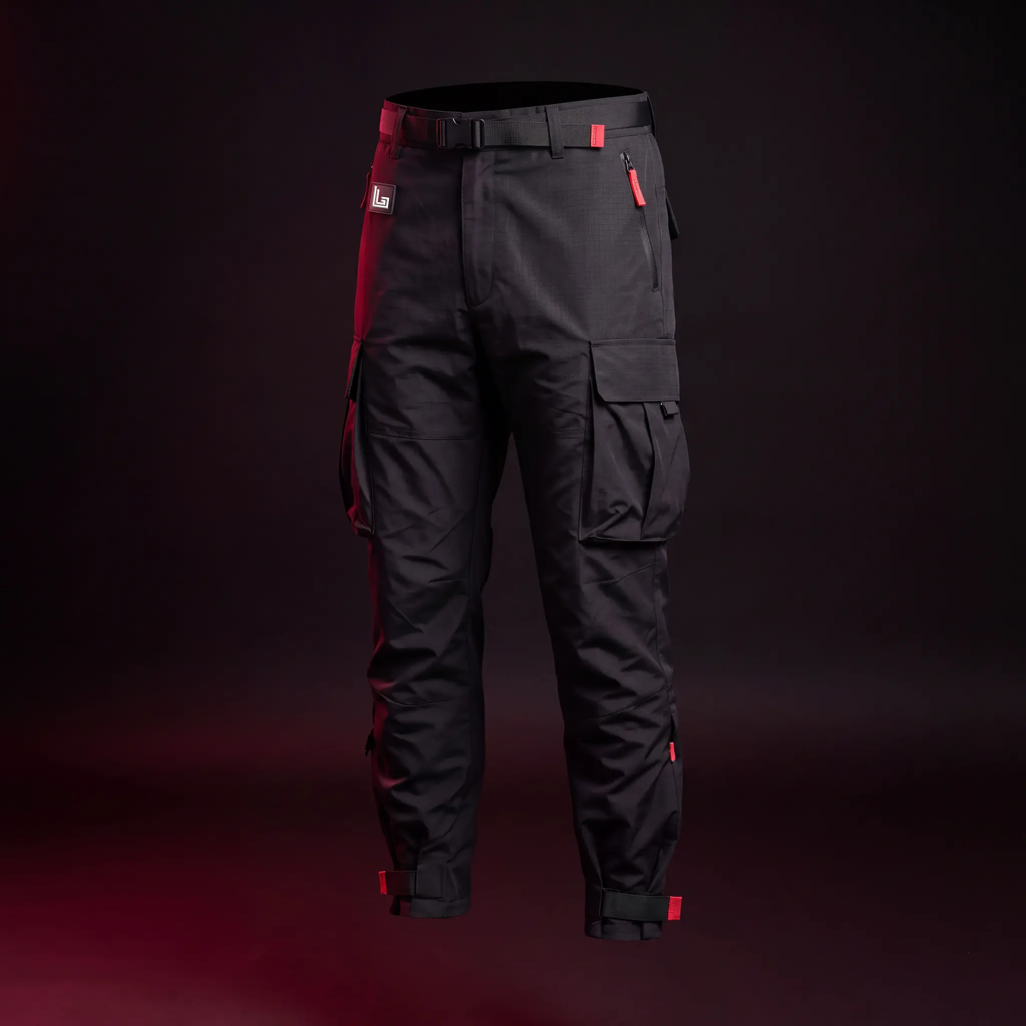 Model in custom black techwear cargo pants with straps and buckles by Lethletic