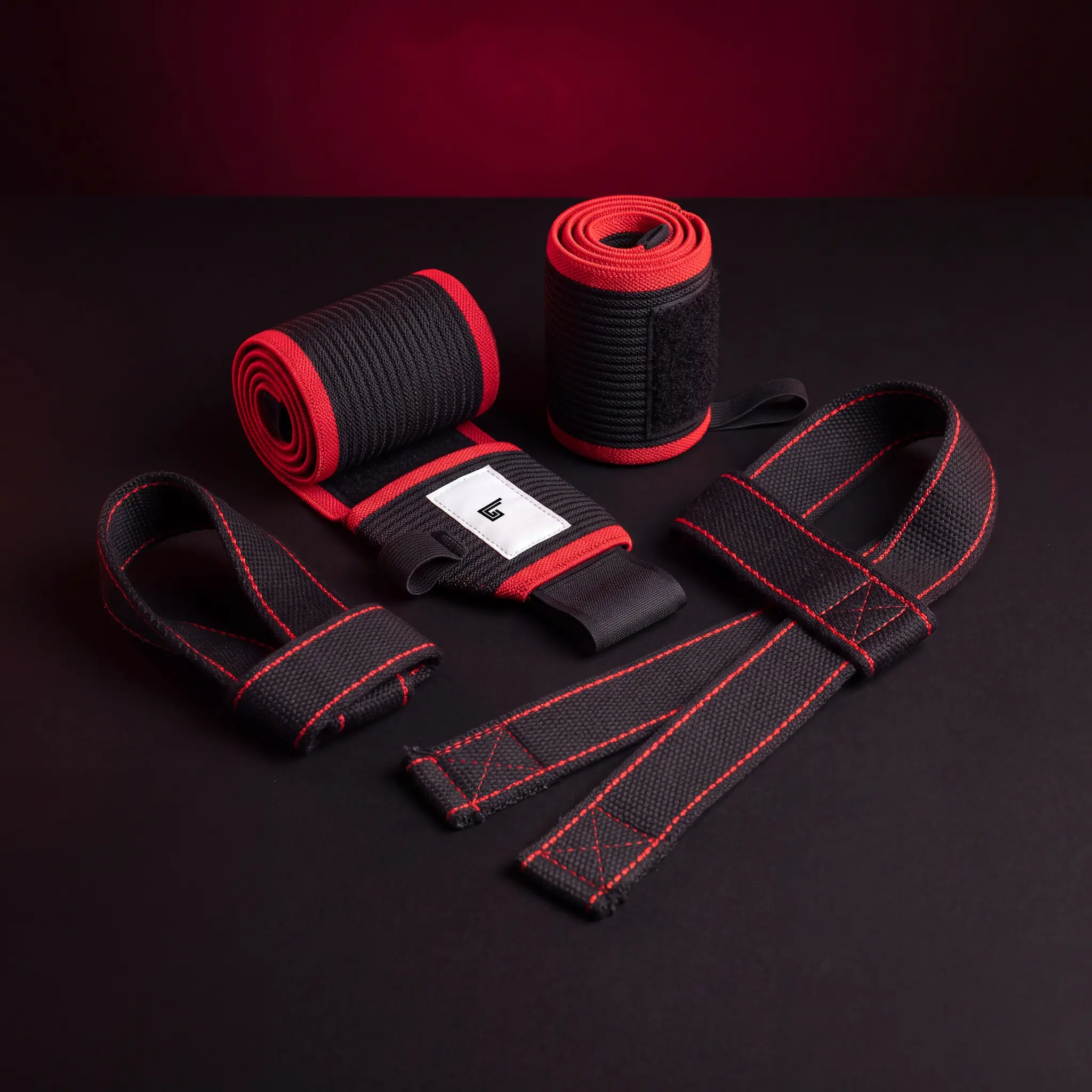 Custom wrist wraps and lifting straps with gym logo by Lethletic