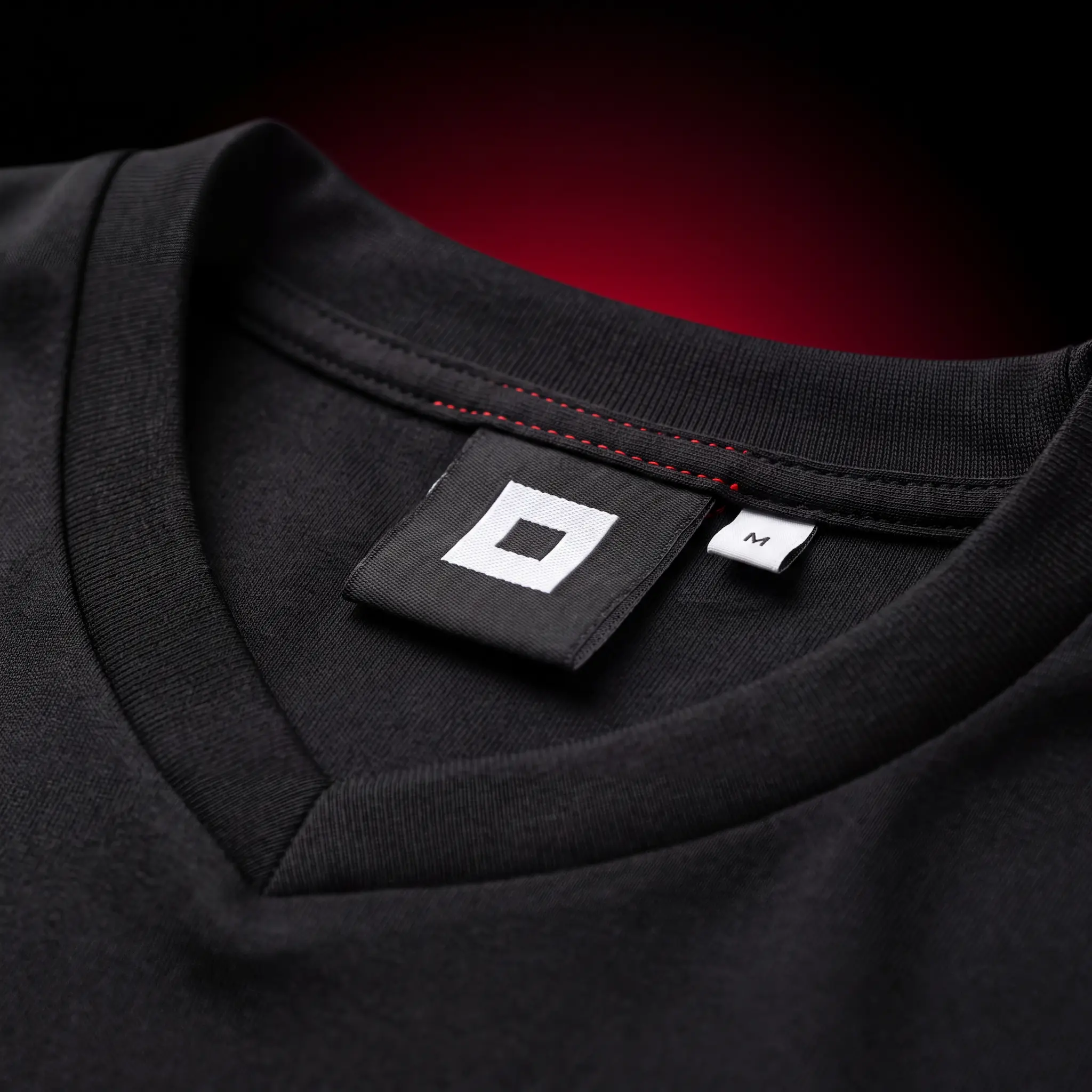 Custom woven neck label inside a private label soccer jersey